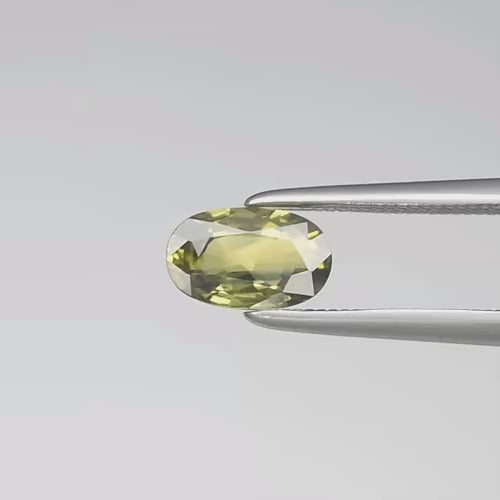 Natural Unheated Thai Sapphire – 0.77 Ct Oval Cut (Yellowish Green)