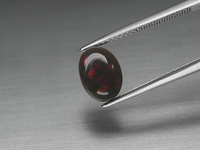 Natural Black Opal - Oval Cabochon - 1.06 ct (8.8 x 6.5 x 3.5 mm)