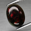 Natural Black Opal - Oval Cabochon - 1.06 ct (8.8 x 6.5 x 3.5 mm)
